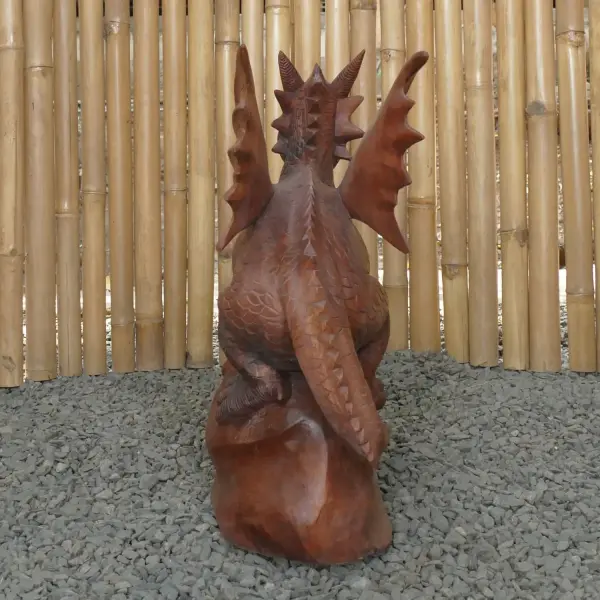 Product image 6 of the product “Dragon with leg lifted on the right made from suar wood, about 50cm Height ”